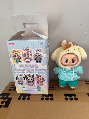 Pop Mart - The Monsters Hello Kitty & Friends  ( Pomppompurin)